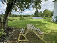Hilltop Farmhouse with sunrise sunset porch overlooking hills and holler