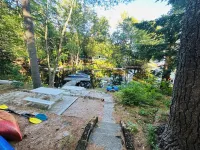 Professionally styled waterfront cottage on Sebago.  Cozy and Serene.