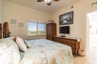 Top-Floor Waterfront Condo with Bay View + Pool and Hot Tub