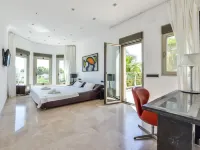 Large modern villa with indoor and outdoor pool sauna and bar.