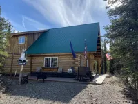 Log House on Denali Airstrip at Mile Post 229.5 of the Parks Highway.