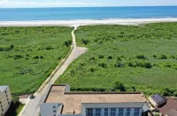 A beautiful beachfront property stunning  views of the beach, and Atlantic City.