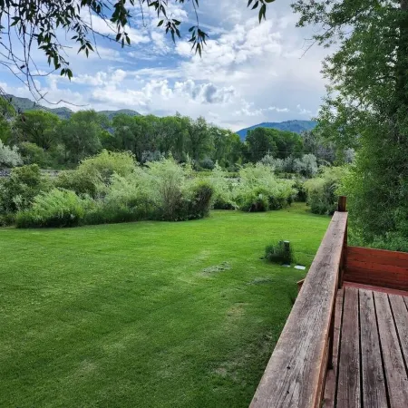 Spacious Riverside Four Bedroom Retreat