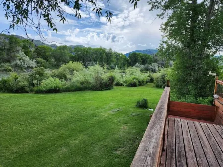 Spacious Riverside Four Bedroom Retreat