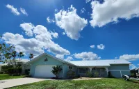 Tranquil Waterfront Pool Home with beautiful views and sunsets and great fishing