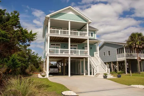 Beachside Bliss!  Ocean views, beautiful pool and a 2 minute walk to the beach!