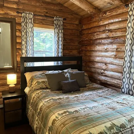 Beautiful private beach area within steps from the modern updated log home