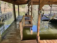 Take a break and unwind on our waterfront screened in porch
