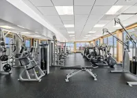 Chic Highrise 2BR King Bed Deluxe Escape Pool l GYM l Balcony Near DC/Metro/Mall Hotels in 