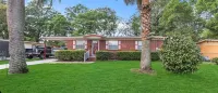 Charming 3/1 home in Jacksonville, 8 min to Stadium with Large Screen Porch Hotels near Plato's Closet - Regency, FL