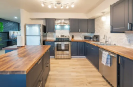 Modern retreat with games room in central location!