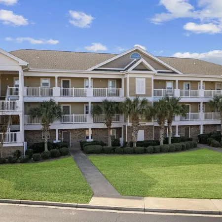 Modern Golf-View Condo • Barefoot Resort • Pools • Beach Gear Included