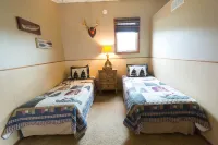 A beautiful mountain lake setting located in the 'Heart of the Black Hills'