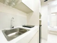Minimalist and Homey Studio Room at Amartha View Apartment Hotels in Ngaliyan