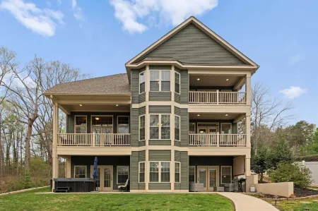 Sleeps 22 Lakefront w Private Dock Pool 2 Houses Lake Living by AvantStay