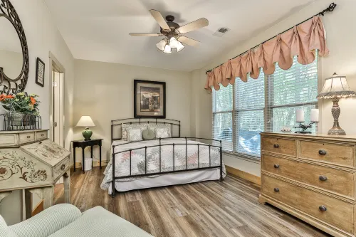 Charming Cabin with Creek and Scenic Deck - Stylish Escape