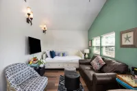 Relaxing waterfront home with private hot tub, grill, & furnished outdoor areas