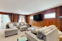 Inviting riverfront home with patio & fireplace, near skiing & golf