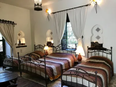 Auberge Chez Momo II Hotels near Imi'Ntsart