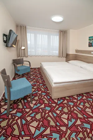 Hotel Arena Отели рядом с достопримечательностью «Feel Real Chomutov»