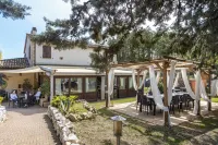 La Valle Dei Caprioli Village Bungalow Park - Freelandia Azienda Agricola Hôtels à : Tavoleto