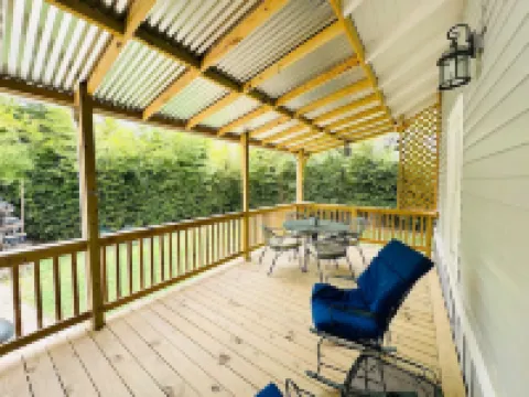 Private Backyard with Charcoal Grill and Porch - Charming Cozy Haven