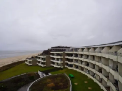 Penthouse by North Sea with Pool and Sauna