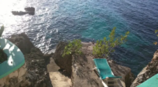 Seacret Studios - Cozy Jamaican Retreat Apts by RedAwning