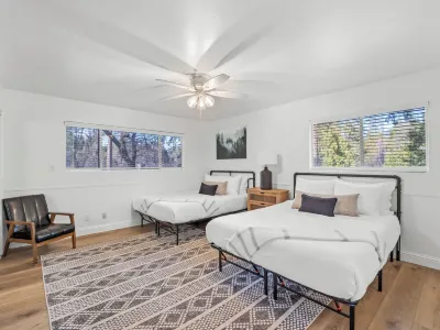2 Units! 9 Bed/5 Bath, 2 Hot Tubs, 2 Game Rooms! Main House + Barn!