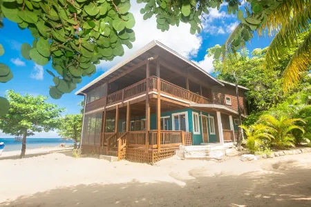 Modern Beachfront Casita with Dock and pool ON THE BEACH