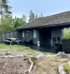 Cozy vacation home in southern Norway (Tromøy, Arendal) with a boat and a pier.