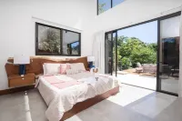 Luxury Beachside Villa in a Private Gated Community – Walk to the Ocean!