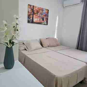 Authentic Suburban Retreat: AC Bedroom, Wi-Fi, 5 Mins to Bridgetown & Beach Rooms