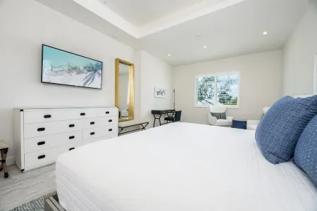 7 Mile Beach Beach Penthouse. Ocean views from Roof Terrace and a Pool Pavilion