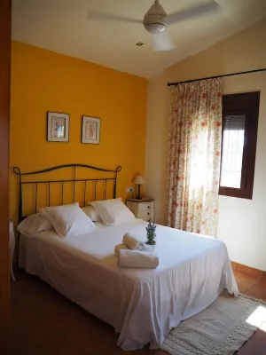 Cottage with fenced garden and tennis court, basketball. ideal for families.