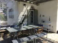 Villa Elia - The charm of Tiniote architecture feet in the water! Hotels in Kardhiani