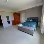 Cosy apartment on Merchant Man Ave Crown Point Tobago. near beaches- night life Hotels in 