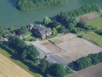 Unique "Seeblick" vacation apartment located directly on the lake Hotels in Metelen