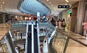 Shi'er Weidi Apartment (Caiwuwei Yijie)