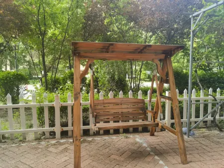 Daguaijia Apartment (Songjiang Road) Отели рядом с достопримечательностью «Meihekoushi Zhangbai Mountain Botanical Garden»