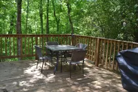 Cozy Pet Friendly Mountain Log Cabin in the Smokies with Deck and fire pit.
