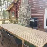 Two story authentic log construction home, built in 1936 with two fireplaces.