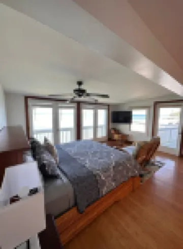 Private gated home with 300 Foot private beach front, beach toys and much more!