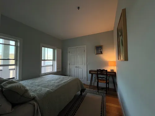 Modern beachfront condo with private deck, harbor views, and parking!