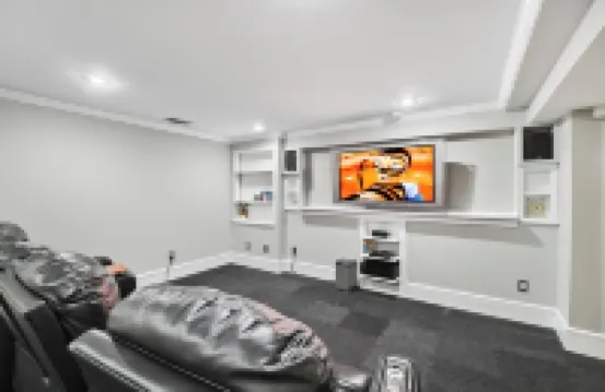 High-end home w/ fireplace, gourmet kitchen, sauna, game rm/ large yard/fire pit