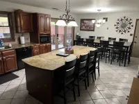 Spacious family Lodge with solar heated pool, hot tub, fire pit and EV charger.