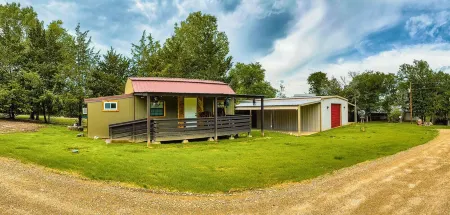 Riverfront house with a party barn & private boat ramp