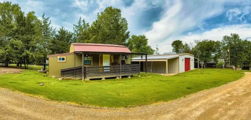 Riverfront house with a party barn & private boat ramp
