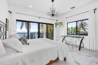 Wide Horizon oceanfront.  4 bedroom, 4 ½ bath,  kayaks, pool + observation deck.