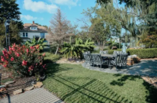 Townhome with Botanical Garden,  Pond, Pool Access, Arcade, and Theater